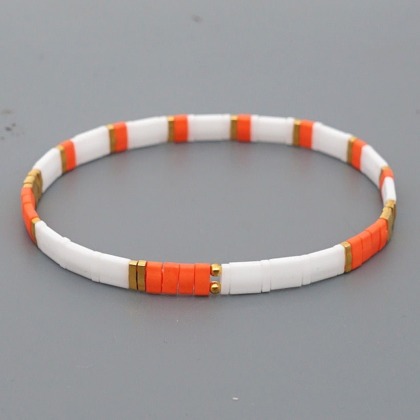 Urnge and White Tila Bead Bracelet